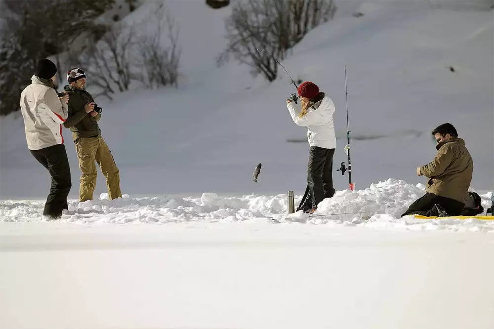 Fishing on a frozen lake